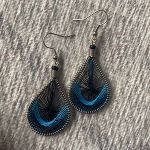 handmade dangly earrings. Woven in metal spring.